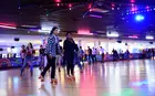 Students at a roller rink
