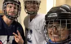 Jesline D'Souza ‘24 and two friends in hockey gear