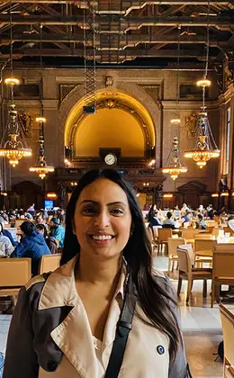 A portrait in a crowded dining hall
