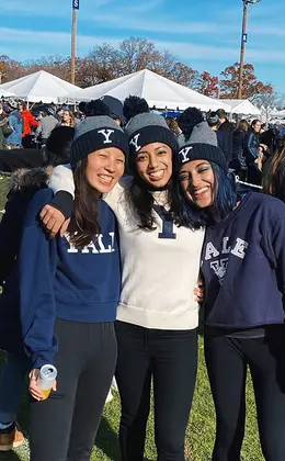 Anna Eapen ’23 at Yale-Harvard game with roommates