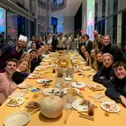 Students around a Thanksgiving table