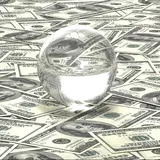 crystal ball on pile of money 