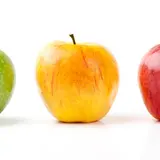 three apples, green, yellow and red