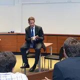 Man talking to a class