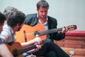 Pedro '14 plays classical guitar like the international man of mystery that he is. Photo by Alina Vorobeitchik '14.