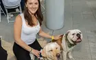 Alice Ervaz with service dog Heidi and Handsome Dan