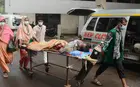 A COVID-19 patient is taken to a hospital in Dhaka, Bangladesh, in July 2021.