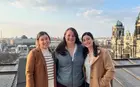 Lexi Abbiati ’25 and two friends on rooftop in Germany 