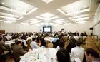 A conference in a hotel ballroom