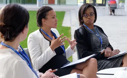 Three students talking