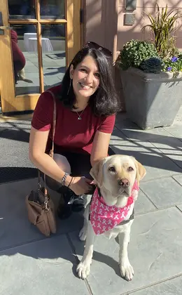 Roshni Walia ’23 with Yale Public Safety service dog Heidi