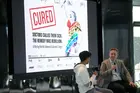 Two people at the film screening of "Cured"