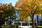 The exterior of Evans Hall in the fall