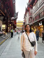 A person standing on a pedestrian street in China