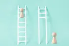 a ladder with all the rungs vs. a ladder missing the bottom rungs 