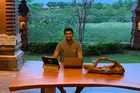 Pranav Daryanani attending remote classes from an open-air space in Bali, Indonesia