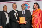 From left: Dr. Thomas Abraham, founder of the Global Organization for Persons of Indian Origin and chairman of GOPIO-CT Awards Committee; Connecticut State Senator Carlo Leone; Prof. K. Sudhir; and GOPIO-CT President Anita Bhat