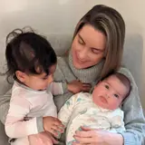 A woman with two babies