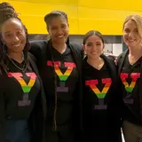 Four women wearing Yale pride shirts