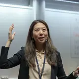 Kelly Shue addressing classroom