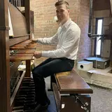 Robert Lucas in the Harkness Tower using the carilonn