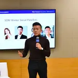 Austin Cai ’25 introducing panelists at a winter social in Beijing