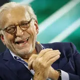 Nelson Peltz laughing on stage