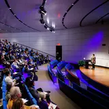 A conference in an auditorium