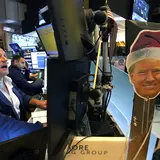 An image of President-elect Donald Trump is displayed on the floor of the New York Stock Exchange (NYSE) on Nov. 26