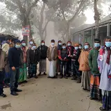 People in Bangladesh wearing masks provided as part of a Yale study. Photo: IPA-Bangladesh.