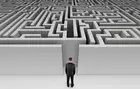 man staring into a maze